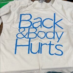 Cream off shoulder top.